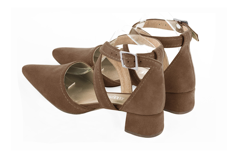 Women's chocolate brown open side dress shoes, with crossed straps. Tapered toe. Low flare heels - Rear view